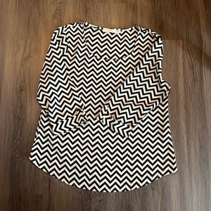 Black & white Chevron blouse. Dress it up or dress down. Super cute blouse
